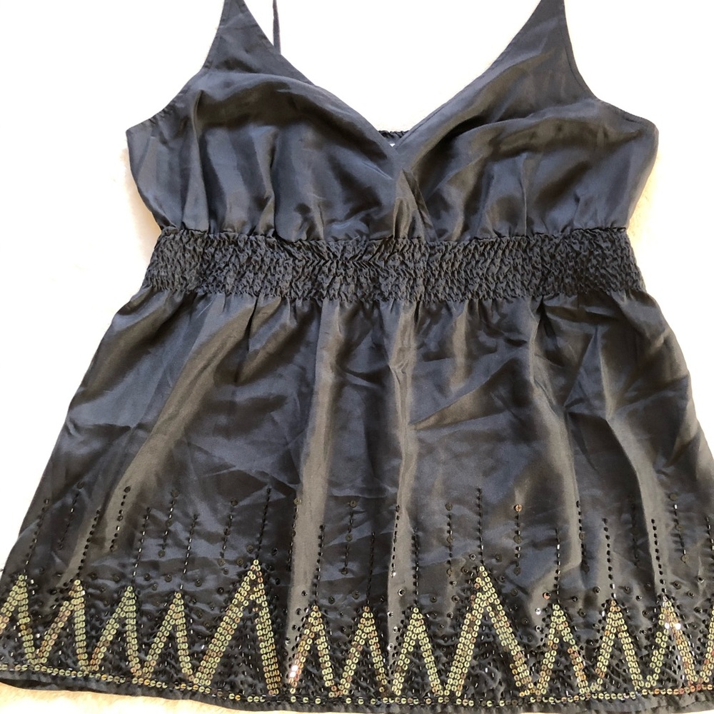 Beautiful black top with gold trim